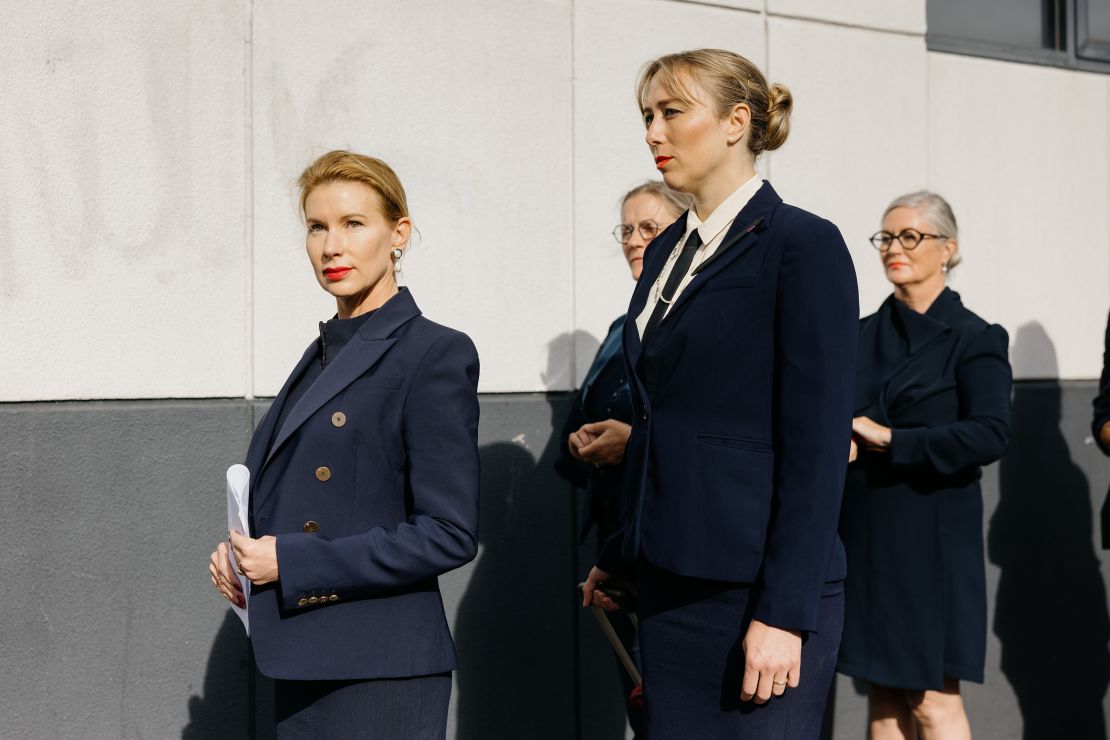 Kaechele (left) and her navy-clad entourage outside the tribunal earlier this year.