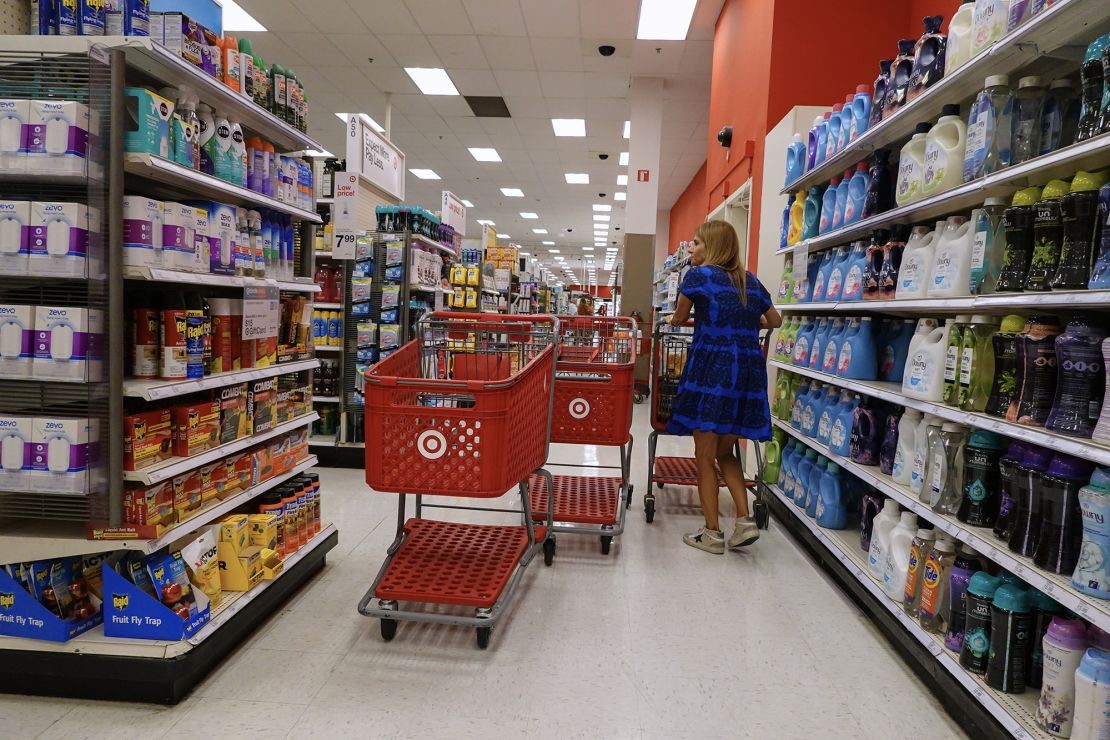 A customer shops at a Target store on May 20, 2024 in Miami, Florida. Target announced plans to cut prices on thousands of consumer basics as inflation cuts into household budgets.